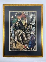 Framed mixed media collage artwork, visible condition and framing details, the artwork contains layered images and abstract elements.