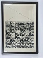 Full front view of framed lithograph hanging on white wall