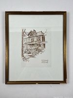 Framed ink drawing portrait of the architectural sketch of a house on 268 Rusholme Rd, showing the full frame and artwork.