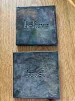 Front view showing both plaques and recessed lettering