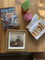 All items overview: plate, three silicone bowls, three cookbooks