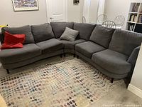 Full view of assembled grey sectional couch
