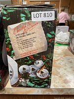 Box showing Christmas Pleasure 20-piece dinner set details