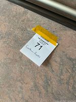 Close-up of lot label and surface of rods