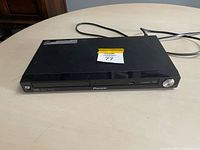 Front view showing disc tray, USB port, HDMI logo, Pioneer branding