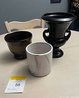 Group shot of three ceramic planters