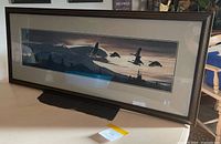 Front view of framed print showing artwork, frame and mats