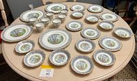 Full set of Royal Albert Silver Birch china laid out on round table