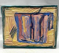 Front view of the colorful rectangular ceramic wall sculpture with abstract carved and painted design in ochre, rust, cobalt and pastel colors.