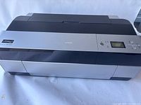 Front and top view of Epson 3800 printer in clean condition, showing its overall design and size.