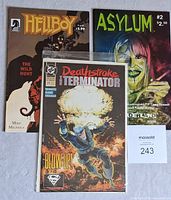 Lot of 3 comics: Hellboy #1, Asylum #2, Deathstroke The Terminator #20 front covers shown together.