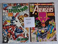 Both comic books together, showing titles and covers distinctly.