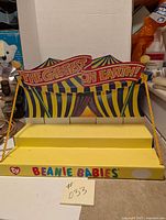 Front view of Ty Beanie Babies cardboard display stand depicting circus tent and 'The Greatest on Earth!' banner