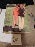 Front cover of the 1975 Sears Spring and Summer catalogue showing two women modeling 1970s clothing on a lawn.