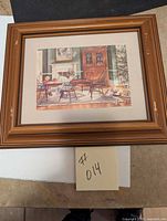 Photo of framed print "The Gift" showing overall condition and frame.