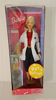 Front view of the Vintage Pet Doctor Barbie Doll in box showing doll, dog figure, and accessories