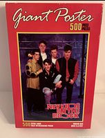 Front of sealed puzzle box showing New Kids On The Block band image and puzzle details
