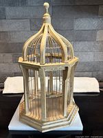 Full view of bird cage front