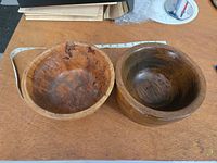 Both bowls side by side with measuring tape showing scale