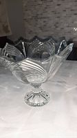 Front view of vintage Bohemia crystal bowl showing pedestal base and geometric cut patterns on scalloped rim