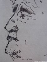 Close-up of etched portrait profile showing line work