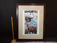 Full view of framed abstract print with measuring stick for scale
