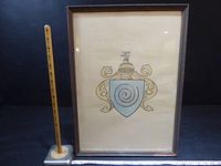 Full view framed heraldic artwork with ruler for scale