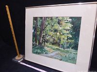 Front view of framed watercolor landscape