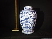 Full view of vase front, ruler for scale