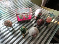 Group shot of all eggs and pineapple on glass table