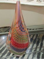 Front view of multicolour teardrop art glass sculpture