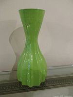 Full view of green glass vase front