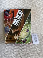 Front cover of the UNLOCK! Timeless Adventures box showing thematic collage including circus and time warp scenes.