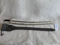 Full sword laid flat with metal sheath and fitted fabric carrying bag.