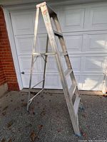 Ladder fully opened showing height, steps and supports