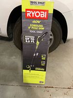 Front of the Ryobi 40V cordless 8 inch pole saw box showing branding, product image and size extension info