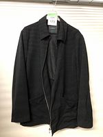 Black Canali men's sportcoat jacket shown on hanger with front partially unzipped.