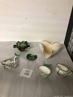 Group photo of all items including Murano glass bowls, ceramic creamer and sugar bowl, green enamel dish, and clear glass bowl with lid.