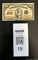 Front of the Dominion of Canada 1923 25 Cent bank note, shows serial number, denomination, and central figure.