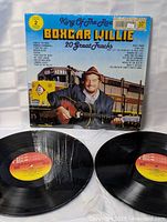 Front cover with artist, title and both vinyl discs displayed