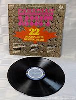 Front cover and vinyl record displayed