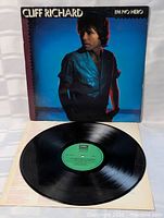 Front cover and vinyl record displayed