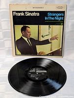 Front cover and vinyl record displayed