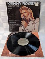 Front cover and vinyl record displayed