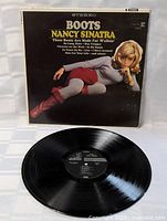 Front cover and vinyl record displayed