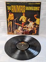 Front cover of The Animals Animalism LP with vinyl displayed