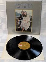 Front cover with vinyl disc displayed