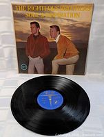 Front of sleeve and vinyl showing label