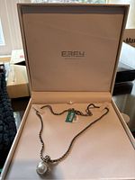 Open Effy New York presentation box showing silver rope chain and pearl-like pendant