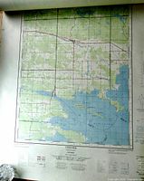 Topographic map of Verner area in Ontario with lake and terrain details, showing grid lines and cartographic elements at the bottom.